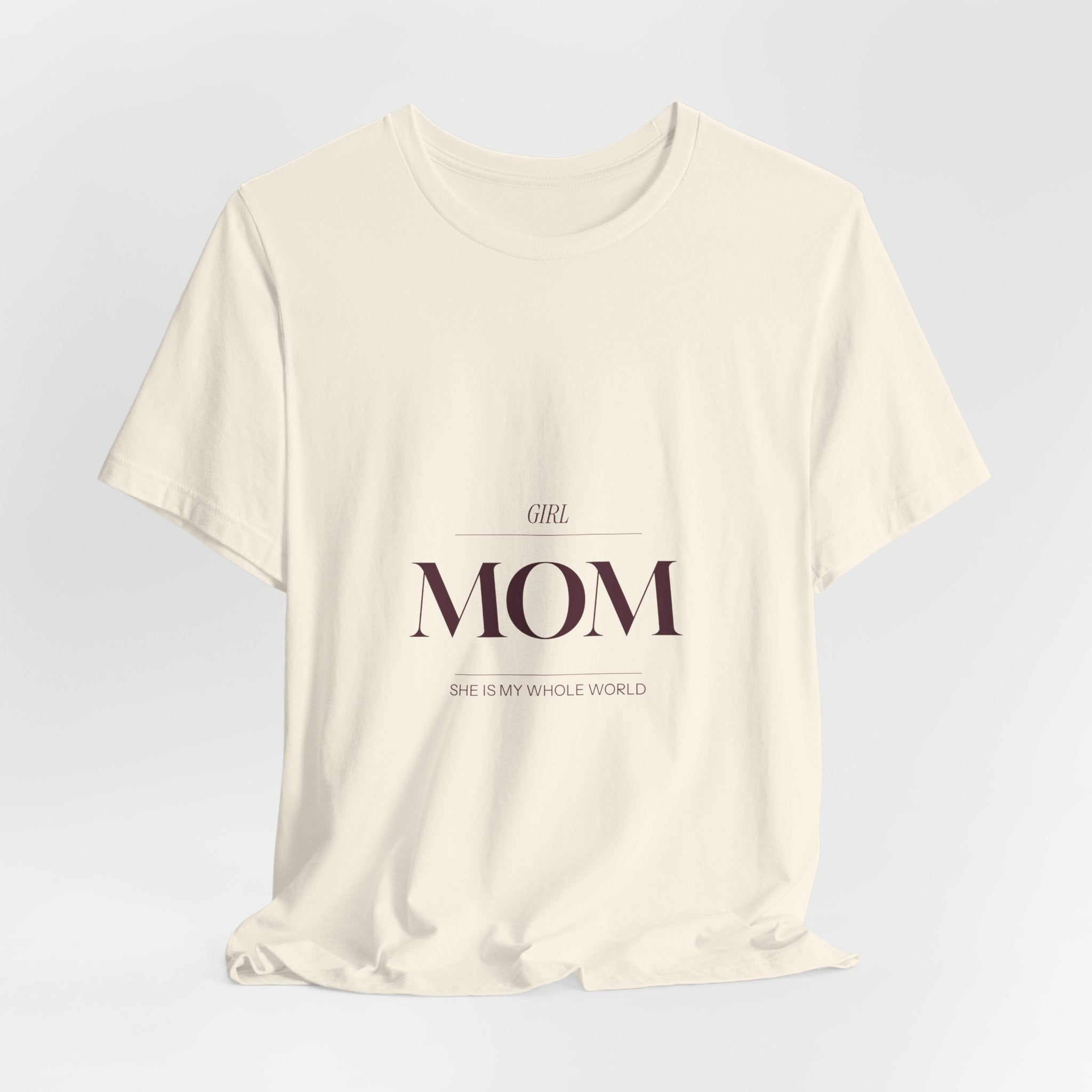 This Girl Mom shirt is for the mom who shows up every single day for her daughter. Elegant burgundy lettering on a soft tee. Understated, beautiful, and built for the mom who wears her heart on her...