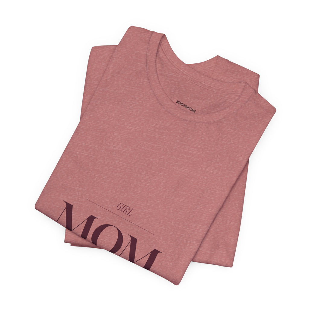 This Girl Mom shirt is for the mom who shows up every single day for her daughter. Elegant burgundy lettering on a soft tee. Understated, beautiful, and built for the mom who wears her heart on her...