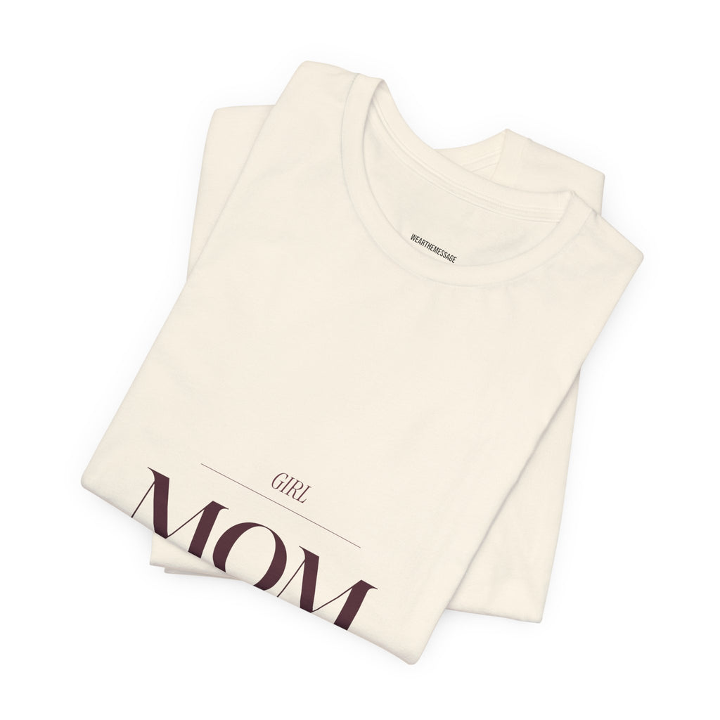 This Girl Mom shirt is for the mom who shows up every single day for her daughter. Elegant burgundy lettering on a soft tee. Understated, beautiful, and built for the mom who wears her heart...