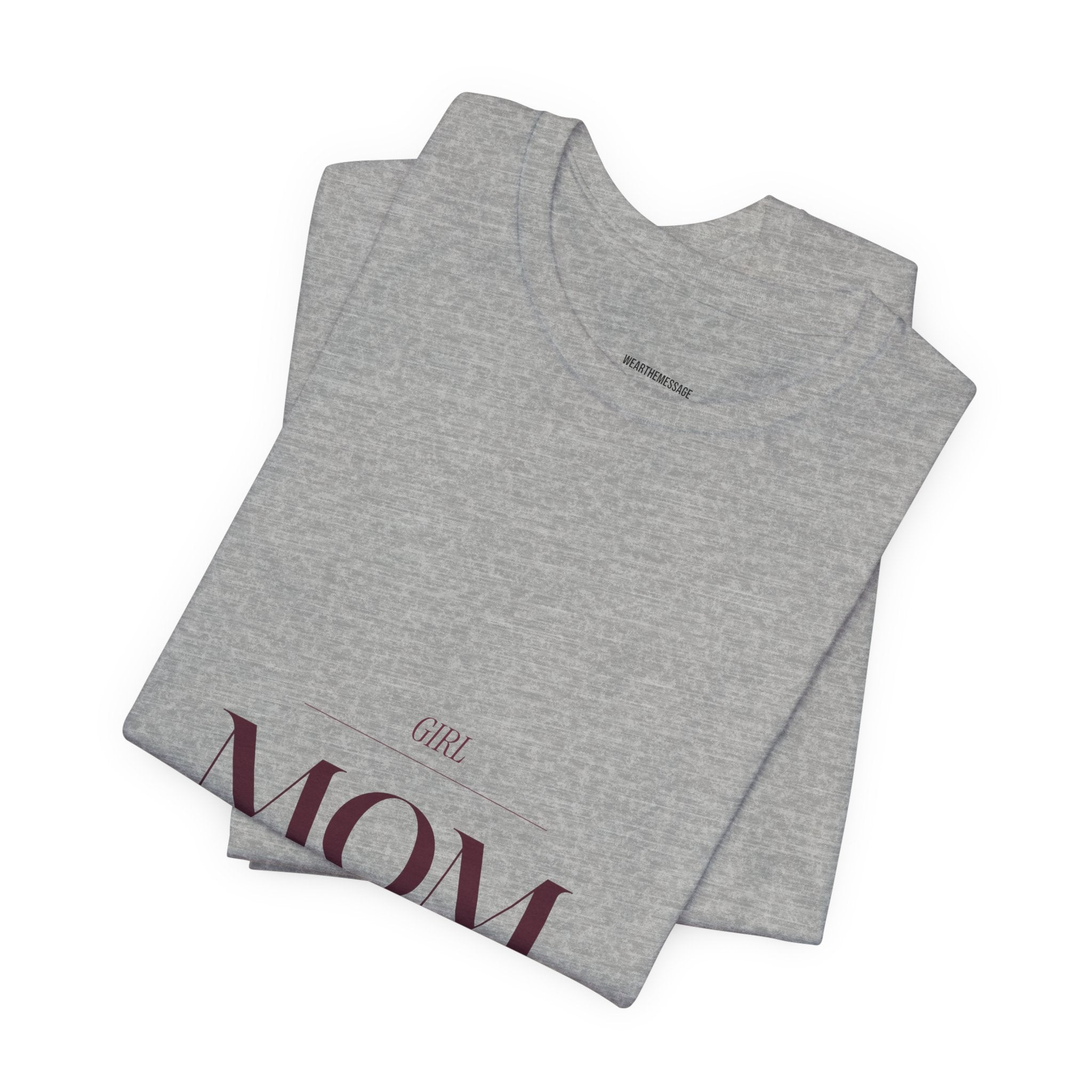 This Girl Mom shirt is for the mom who shows up every single day for her daughter. Elegant burgundy lettering on a soft tee. Understated, beautiful, and built for the mom who wears her heart on her...